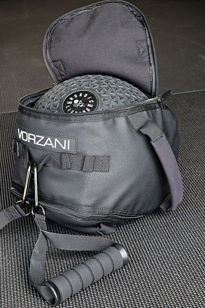 VORZANI Fit Sphere (11.5-inch) covering, unzipped halfway with the 35 lb slam ball inside