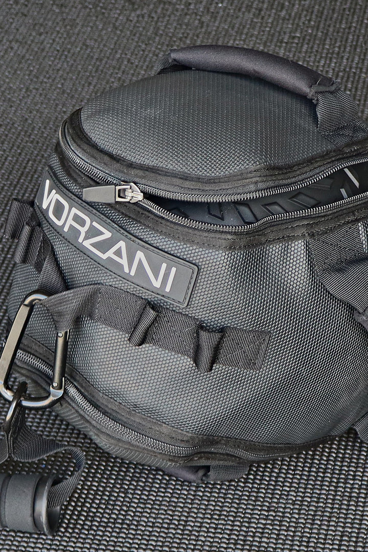 VORZANI Fit Sphere (10-inch) covering, quarter-unzipped showing the weighted ball tread inside